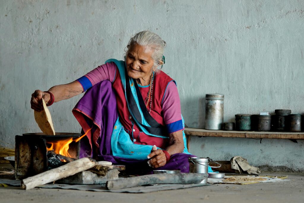 Traditional Indian food cooked on a wood-fired stove.
