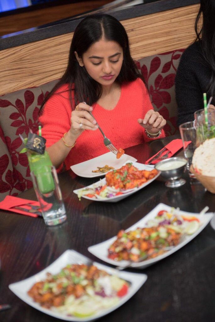 Indian cuisine enjoyed at a restaurant